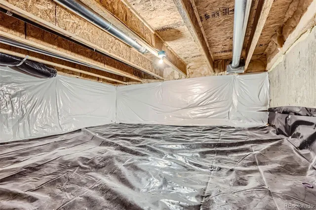 a view of a patio with wooden floor