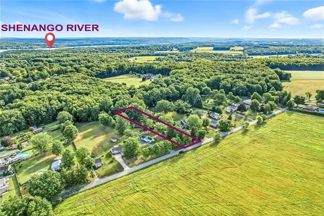 a view of a lake with a big yard