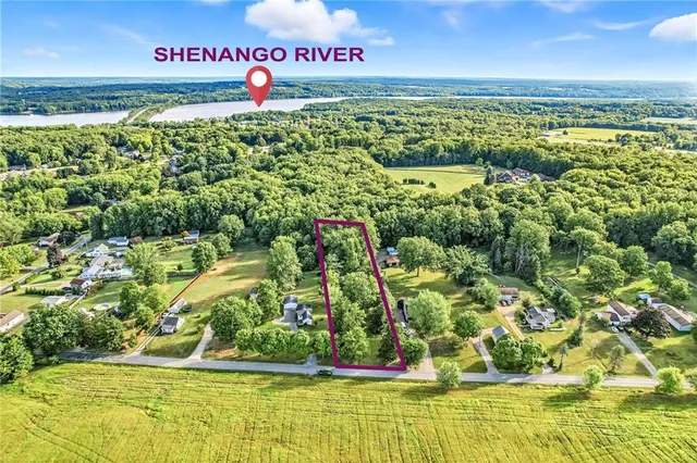 a view of a swimming pool with an outdoor space