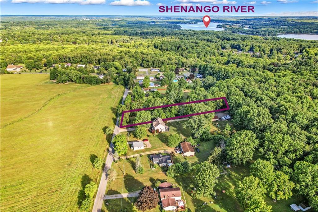 2766 Robertson Road Sharpsville, PA 16150 - Photo 5 of 6 a view of a street with an ocean view