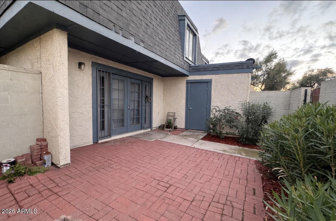3221 West Royal Palm Road Phoenix, AZ 85051 - Photo 23 of 23 a front view of a house with garden
