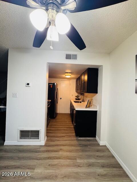 3221 West Royal Palm Road Phoenix, AZ 85051 - Photo 10 of 23 a view of a living room with a flat screen tv