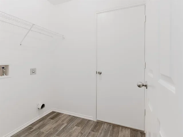 a view of small space with racks on the wall