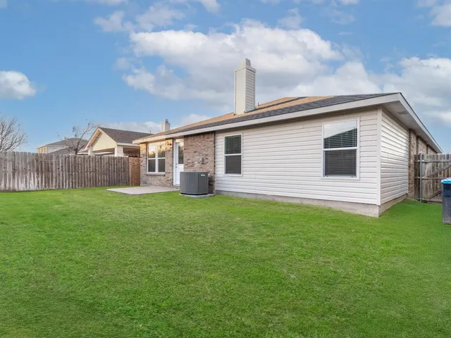 a view of a backyard with a garden