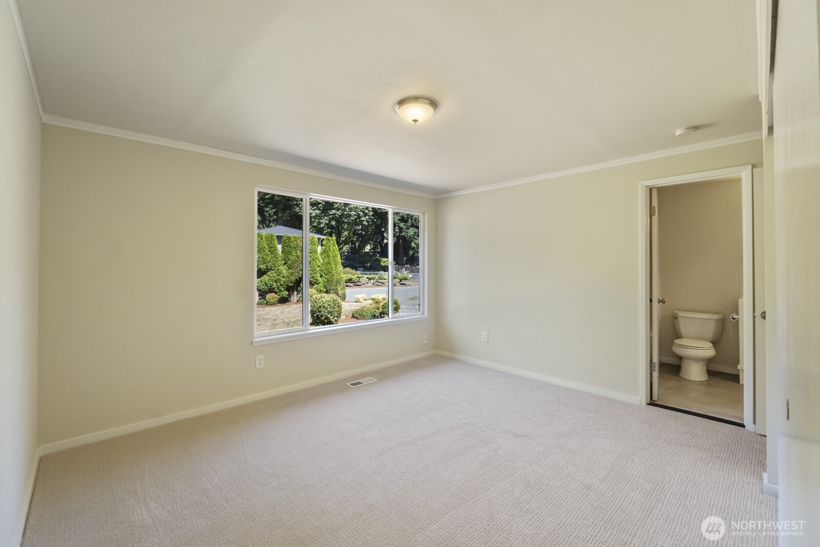 210 219th Place Southwest Bothell, WA 98021 - Photo 14 of 31 a view of an empty room with a window