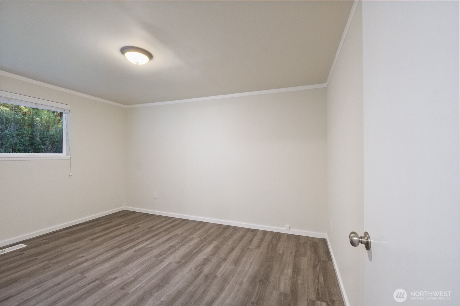 210 219th Place Southwest Bothell, WA 98021 - Photo 18 of 31 a view of a room with wooden floor