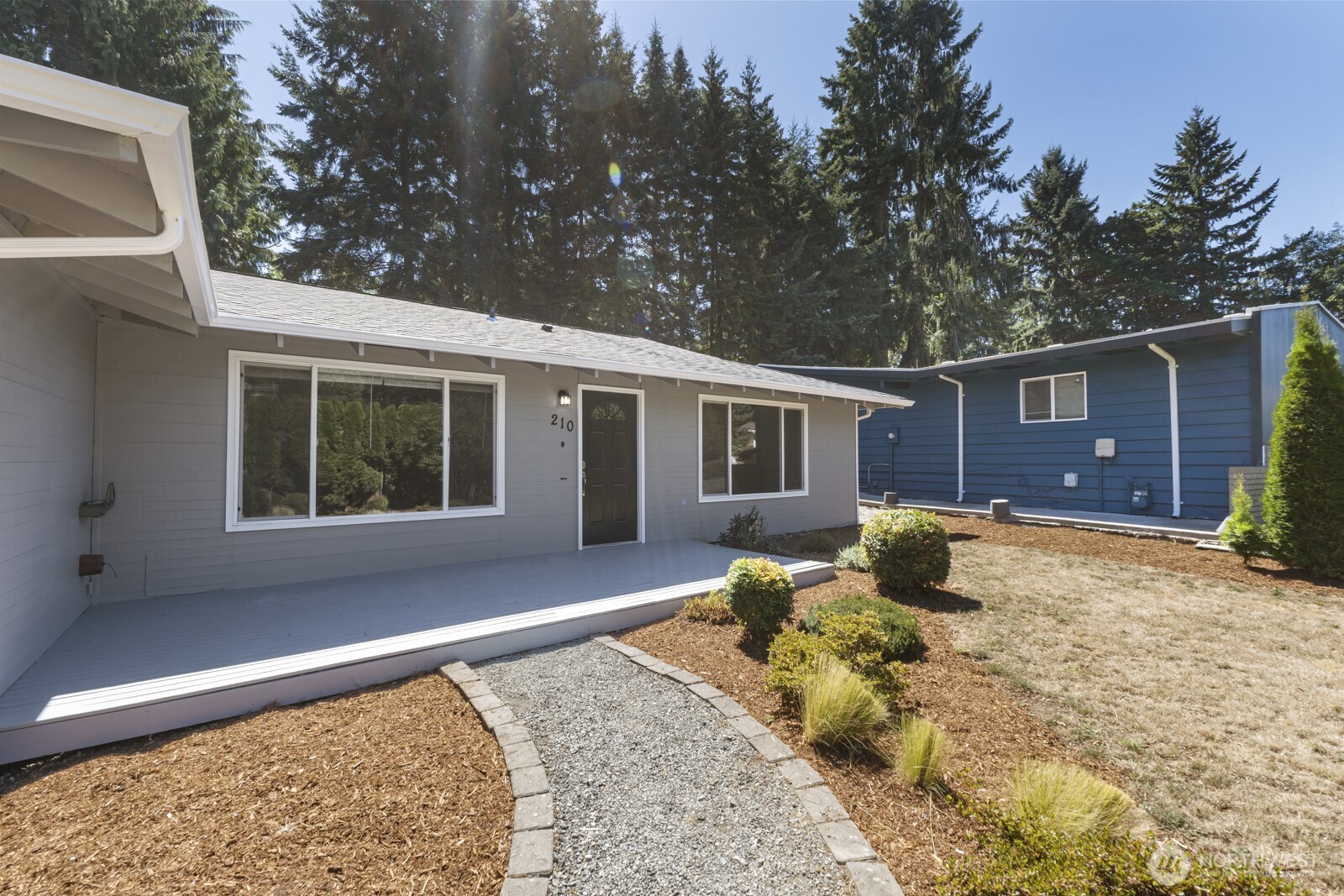 210 219th Place Southwest Bothell, WA 98021 - Photo 27 of 31 a house view with a outdoor space