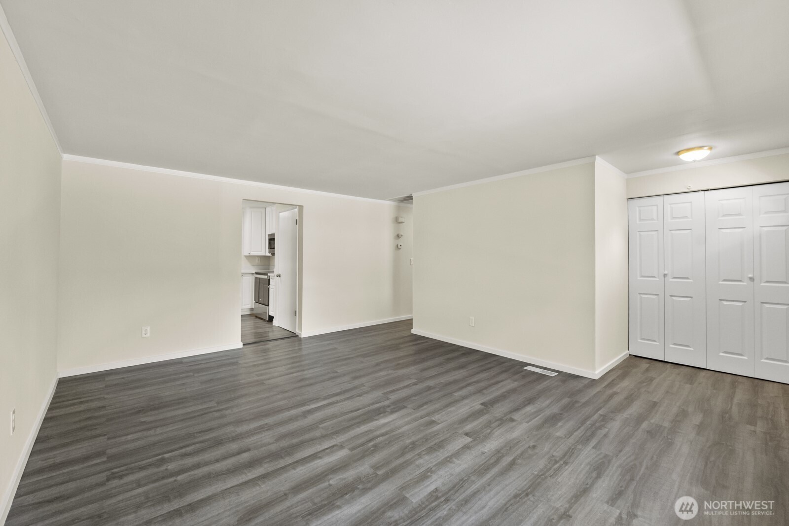 210 219th Place Southwest Bothell, WA 98021 - Photo 5 of 31 a view of an empty room with wooden floor