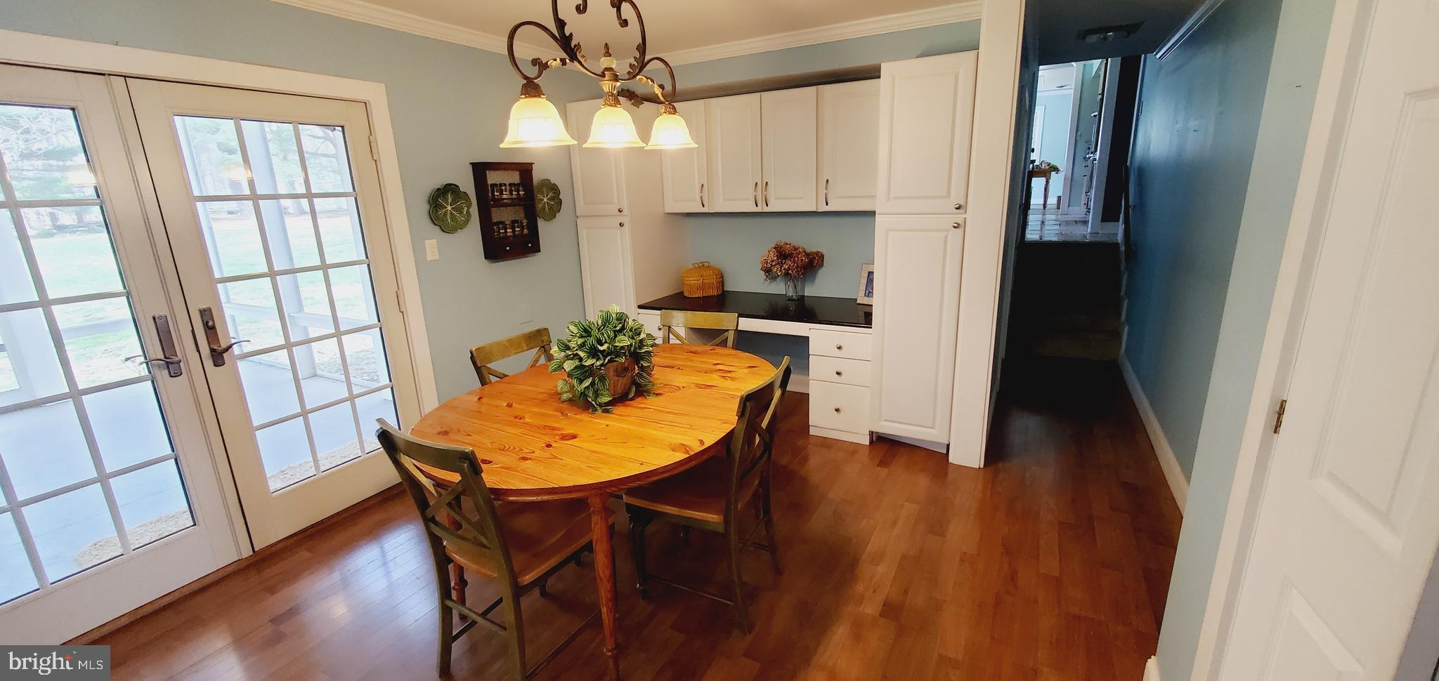 6814 Redberry Road Clarksville, MD 21029 - Photo 30 of 35 In-law kitchen, hall to main hse, doors to porch