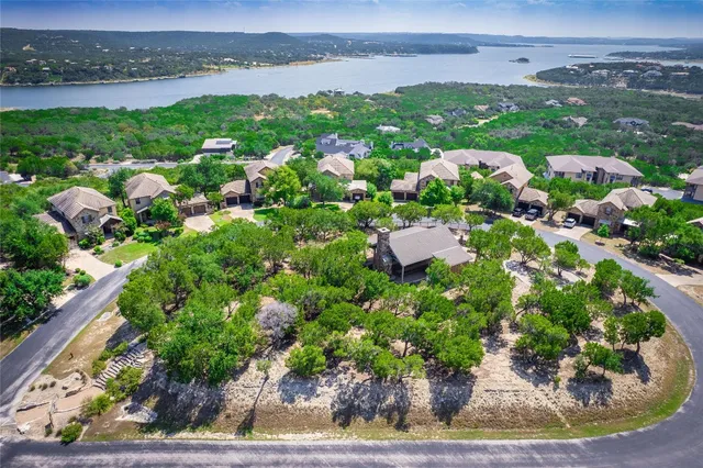 an aerial view of a house with a garden