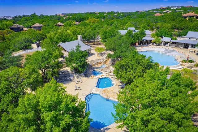 a view of a garden with a lake view
