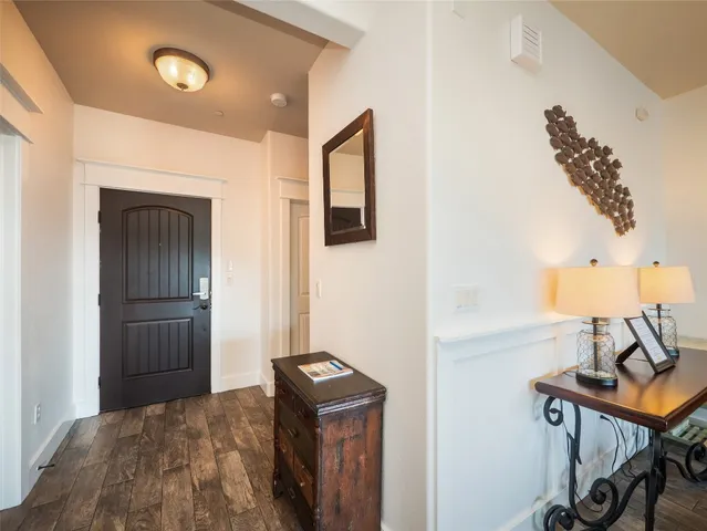 a bedroom with a bed and cabinets