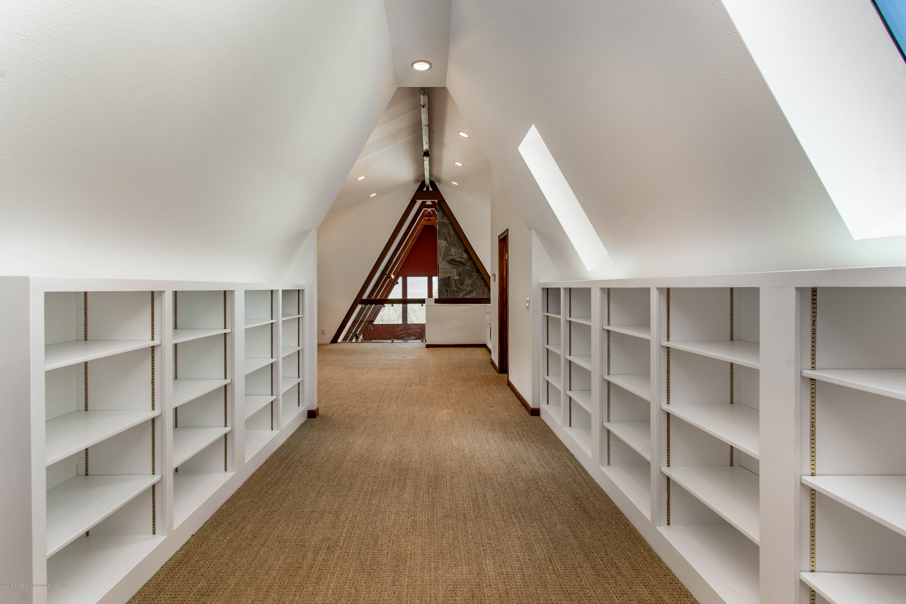 362 Panoramic Drive Silt, CO 81652 - Photo 17 of 43 a view of staircase with wooden floor and cabinet