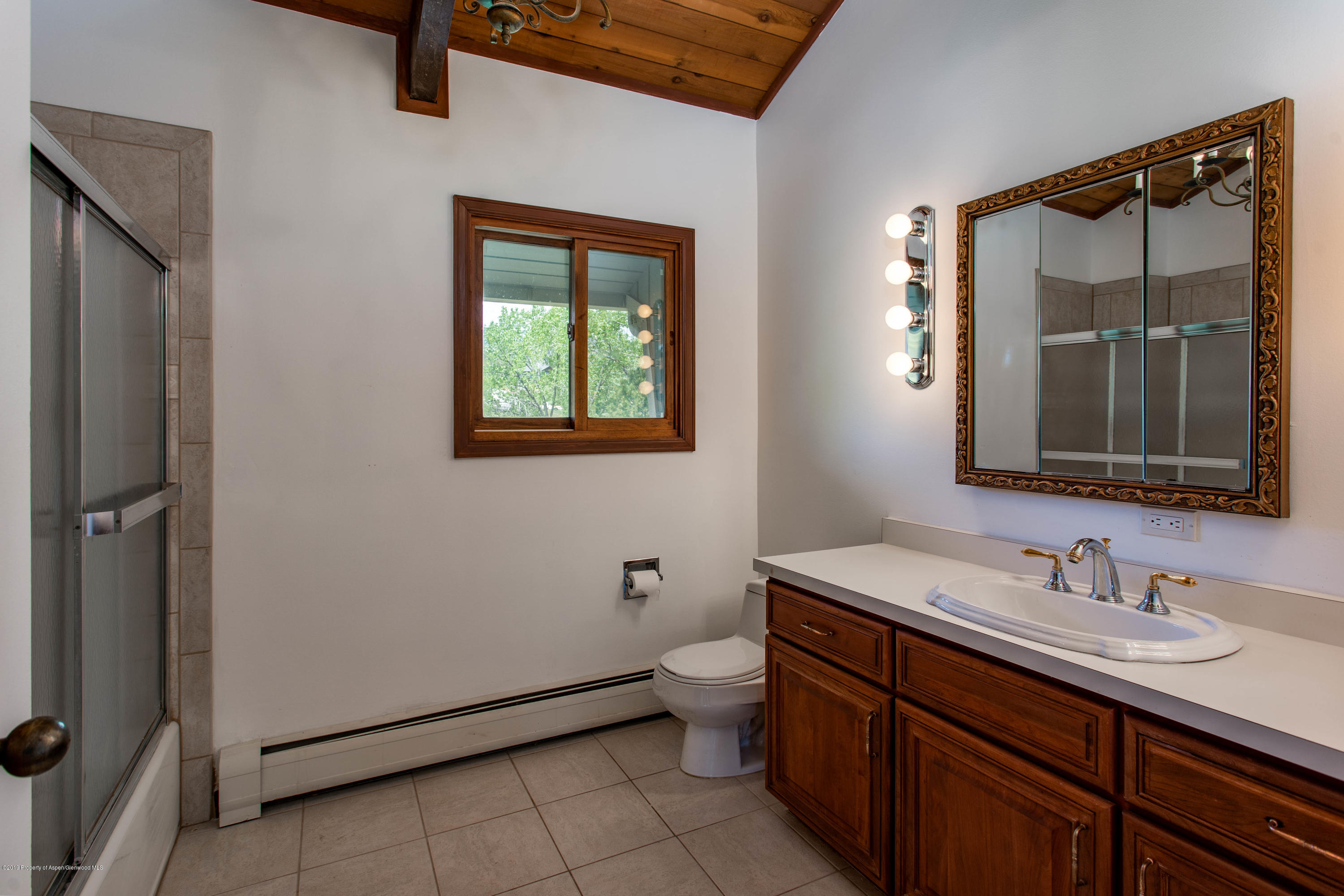 362 Panoramic Drive Silt, CO 81652 - Photo 19 of 43 a bathroom with a sink toilet and mirror