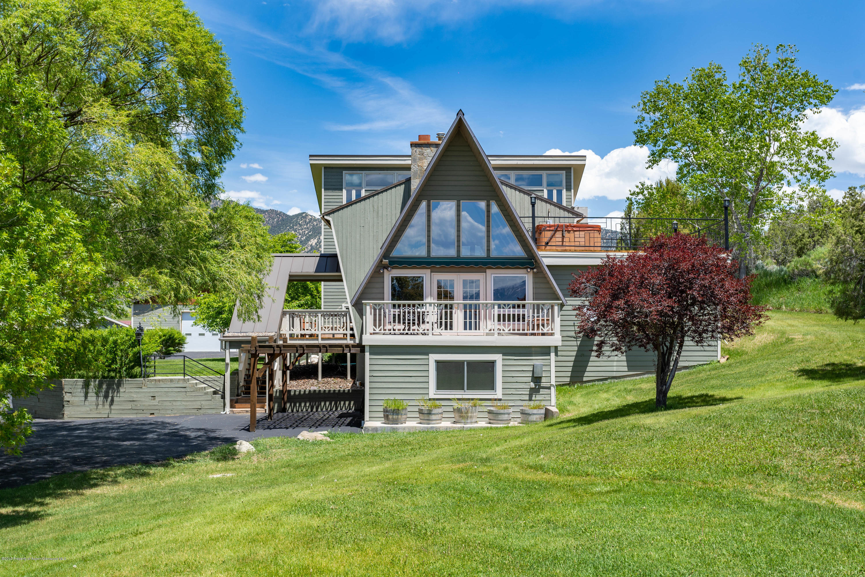 362 Panoramic Drive Silt, CO 81652 - Photo 2 of 43 a front view of a house with a garden