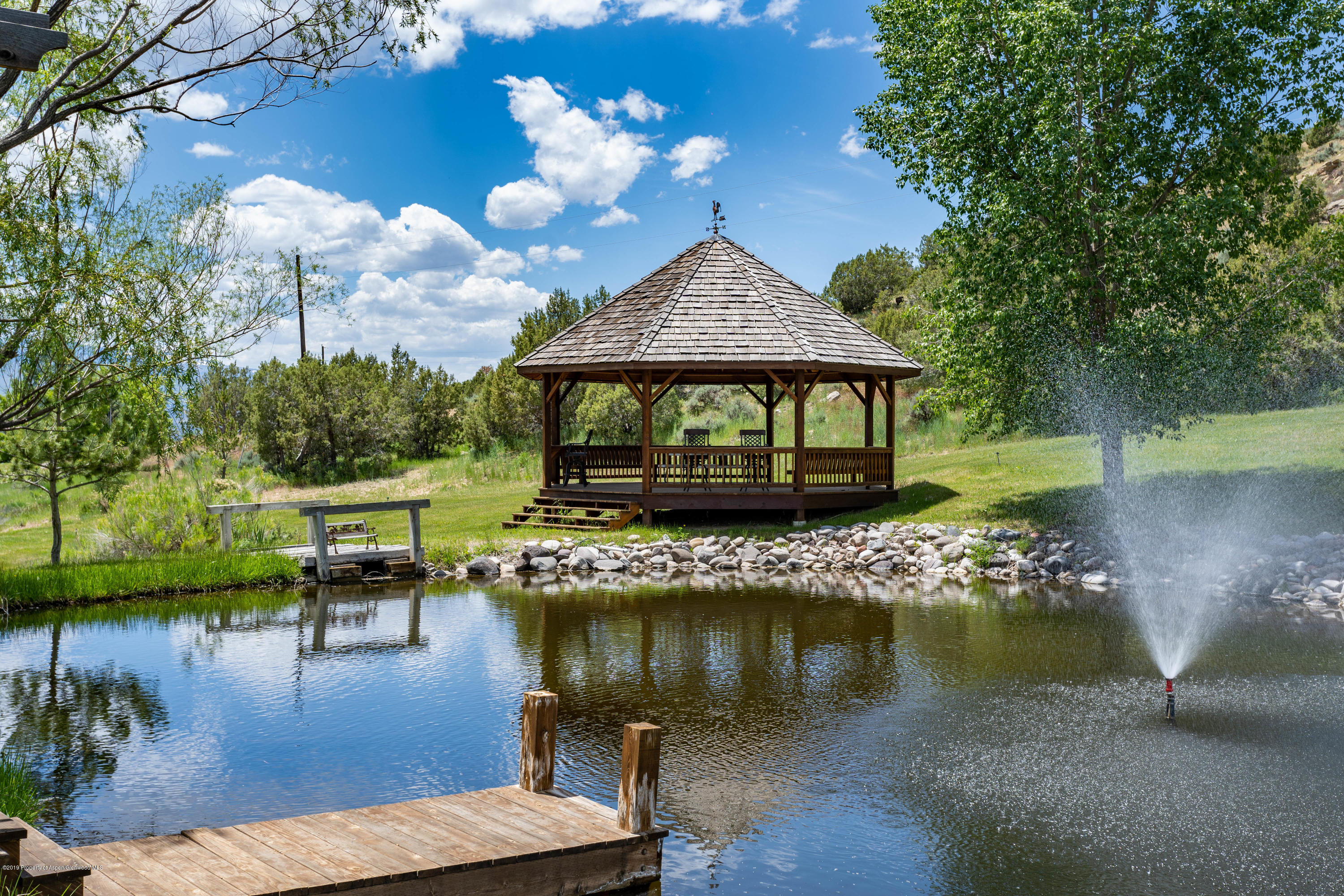 362 Panoramic Drive Silt, CO 81652 - Photo 37 of 43 a view of house with outdoor space and lake view