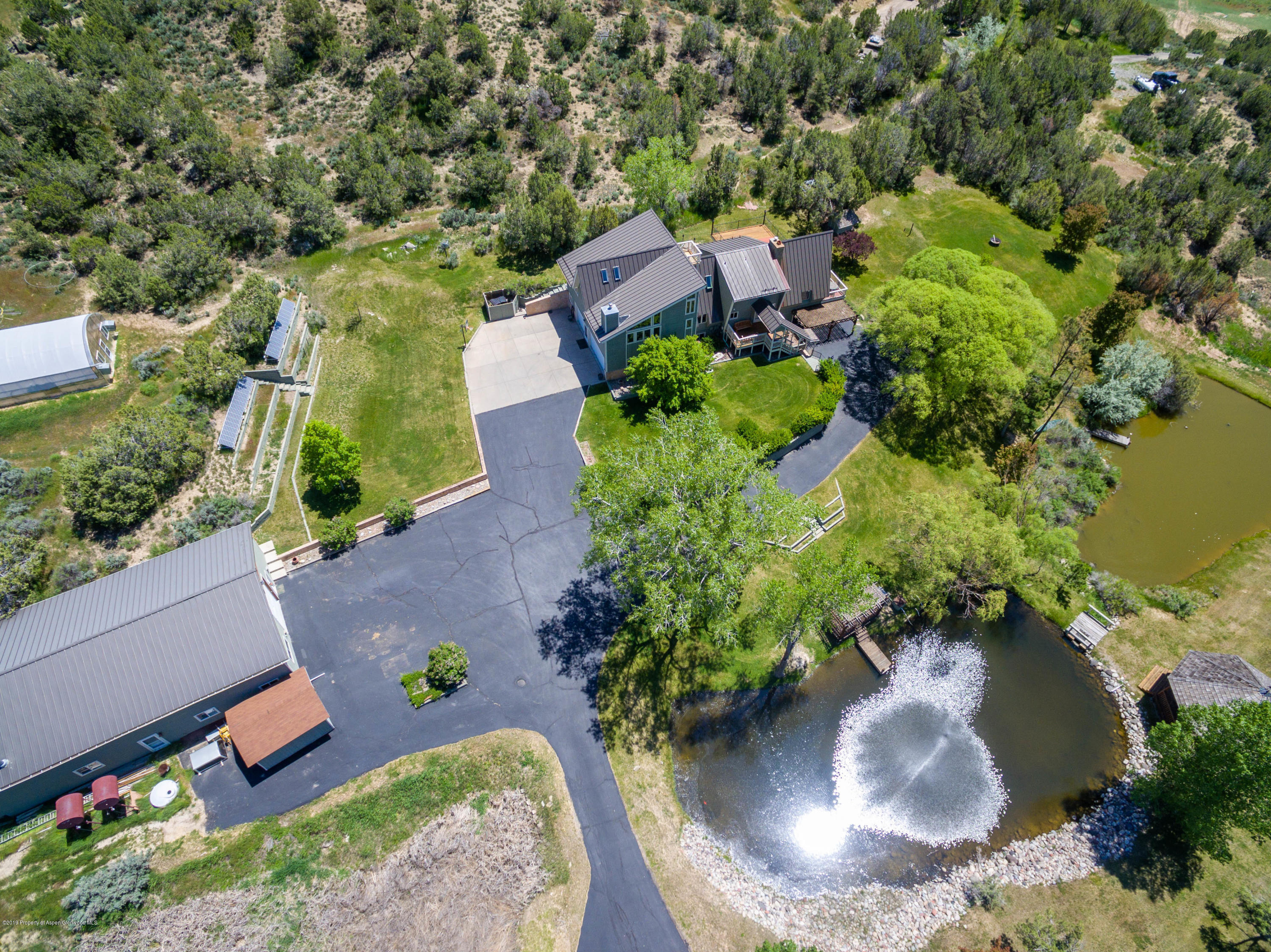 362 Panoramic Drive Silt, CO 81652 - Photo 40 of 43 an aerial view of a house with a yard and lake view