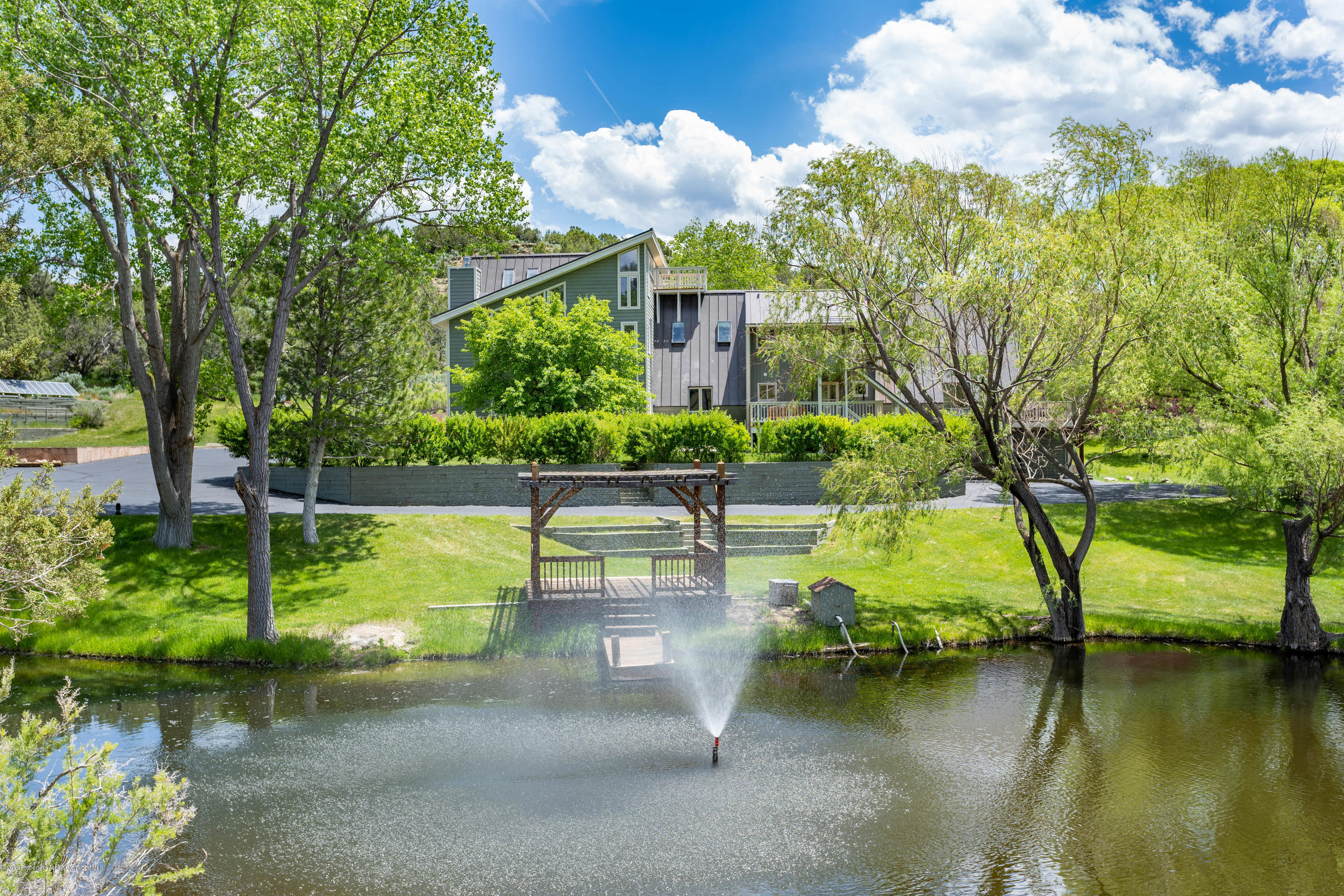 362 Panoramic Drive Silt, CO 81652 - Photo 5 of 43 a view of a swimming pool with a patio