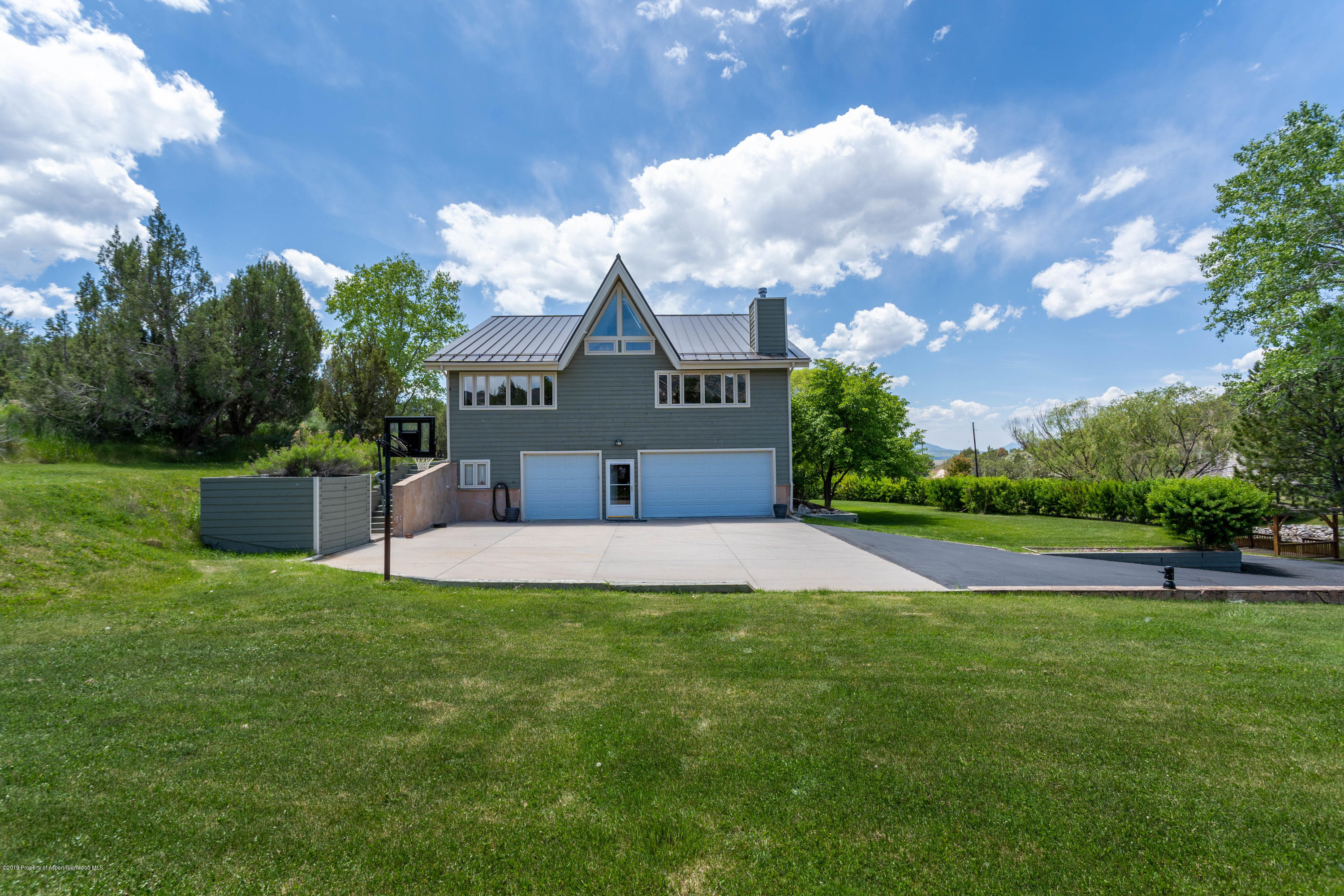 362 Panoramic Drive Silt, CO 81652 - Photo 6 of 43 a front view of a house with a yard