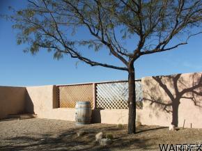 16955 South Lone Ranger Road Yucca, AZ 86438 - Photo 3 of 16 a view of a door in the backyard