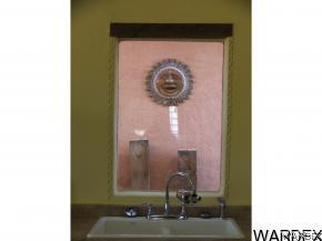 16955 South Lone Ranger Road Yucca, AZ 86438 - Photo 6 of 16 a bathroom with a sink and a mirror