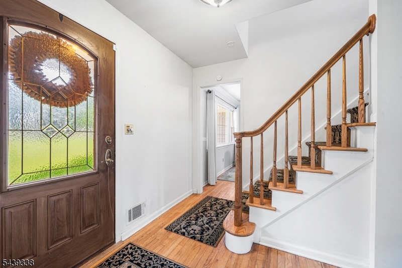 1 Oak Grove Road Flemington, NJ 08822 - Photo 4 of 29 a view of entryway and hall with wooden floor