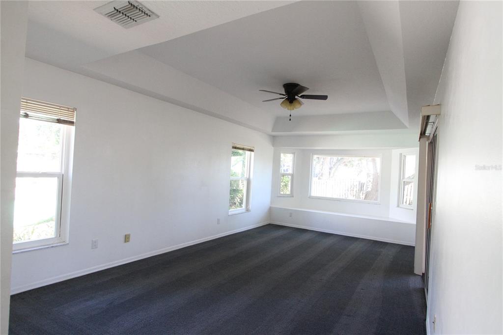 1414 Norwick Drive Lutz, FL 33559 - Photo 13 of 43 a view of an empty room and a window