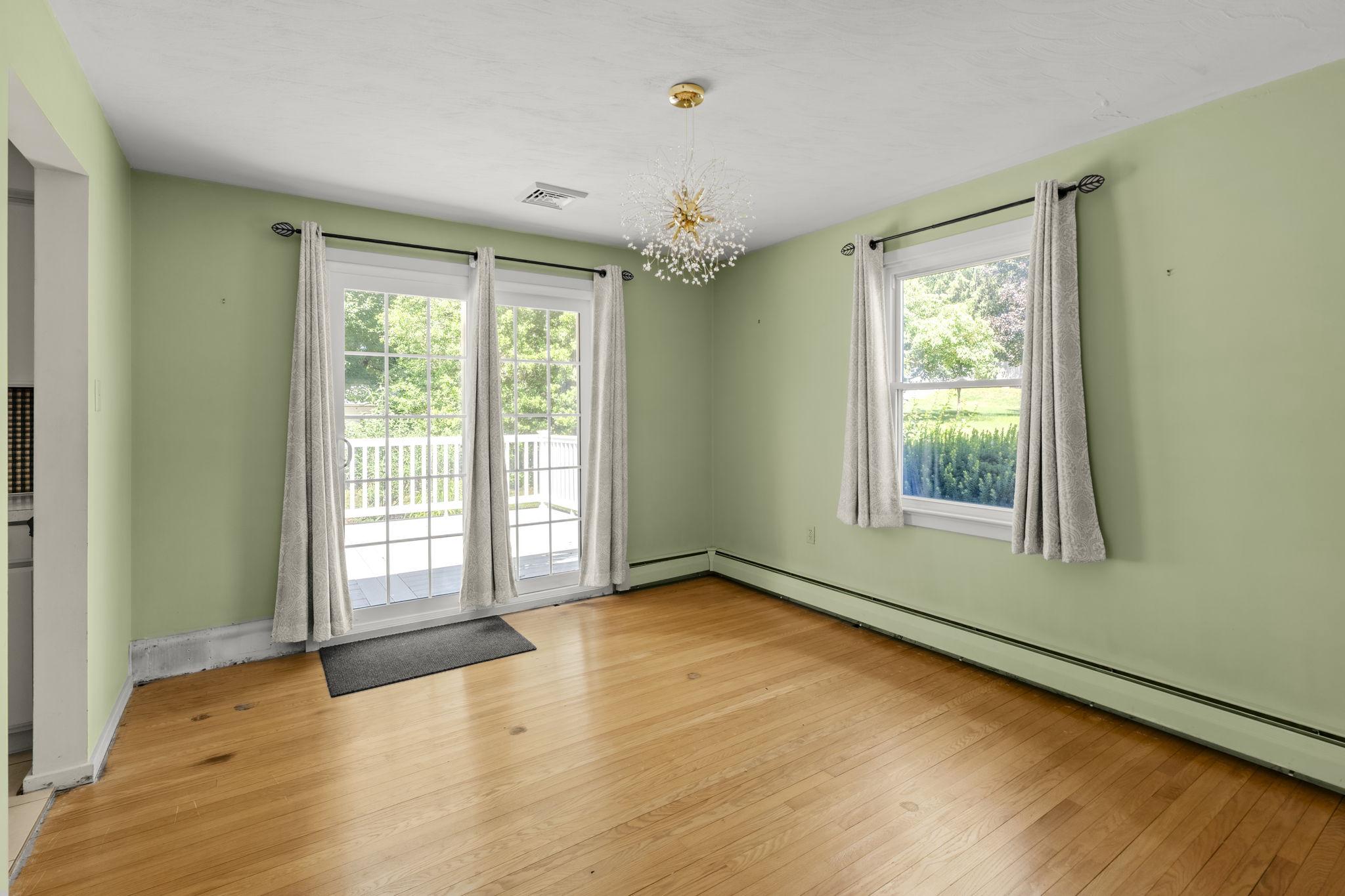 4107 Trowbridge Road York, PA 17402 - Photo 6 of 50 Bright dining room with access to the deck.