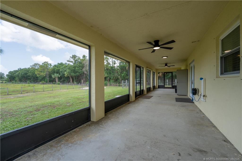 8200 Southwest Springhaven Avenue Indiantown, FL 34956 - Photo 13 of 35 a view of a room with a big yard
