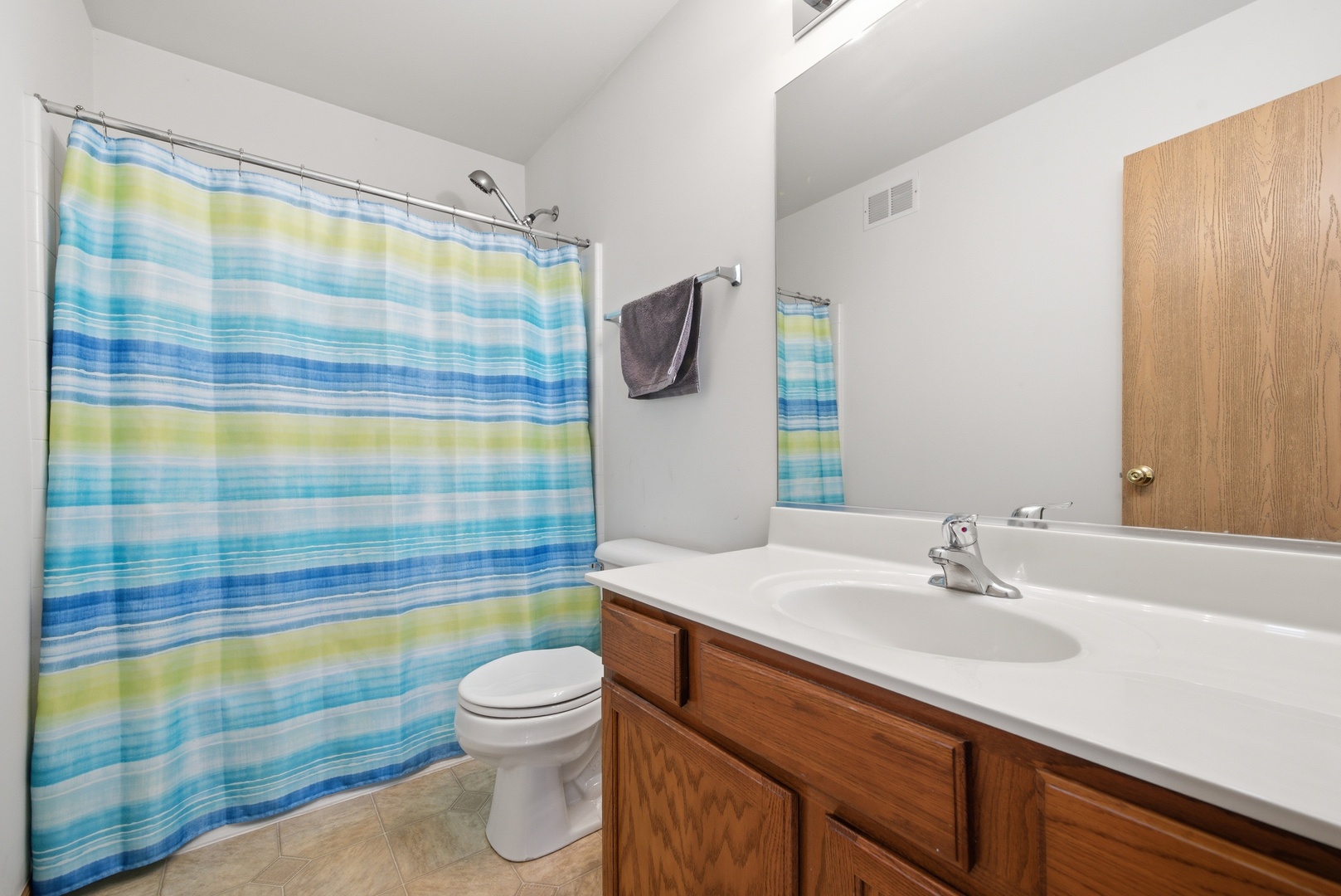 1758 Edith Lane Aurora, IL 60504 - Photo 19 of 23 a bathroom with a sink a toilet and shower