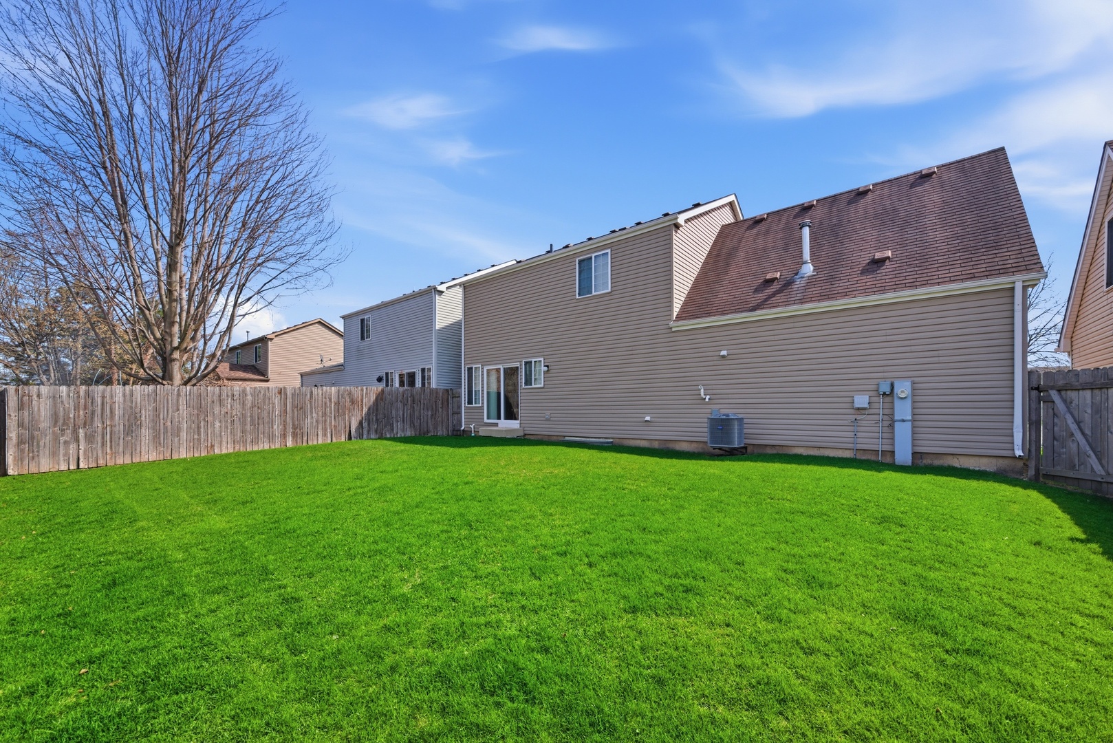 1758 Edith Lane Aurora, IL 60504 - Photo 23 of 23 a backyard of a house with lots of green space
