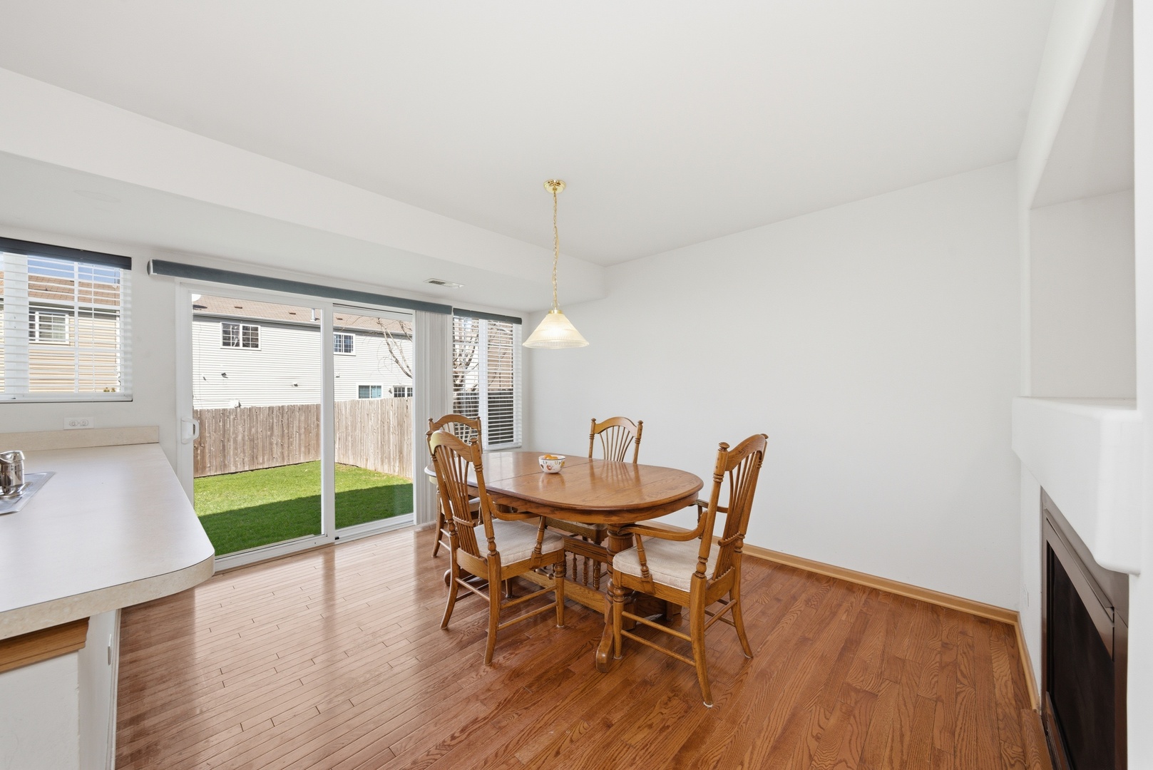 1758 Edith Lane Aurora, IL 60504 - Photo 6 of 23 a view of a dining room with furniture window and wooden floor