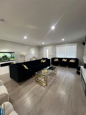 a living room with furniture and a table