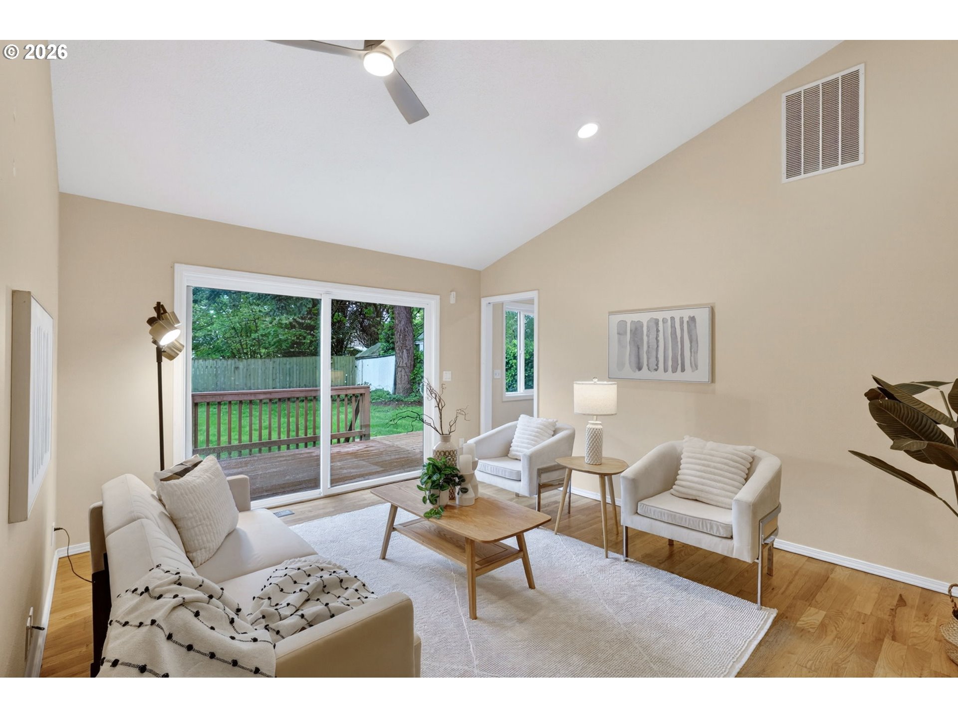 11824 Southeast Liebe Street Portland, OR 97266 - Photo 15 of 48 a living room with furniture and a large window