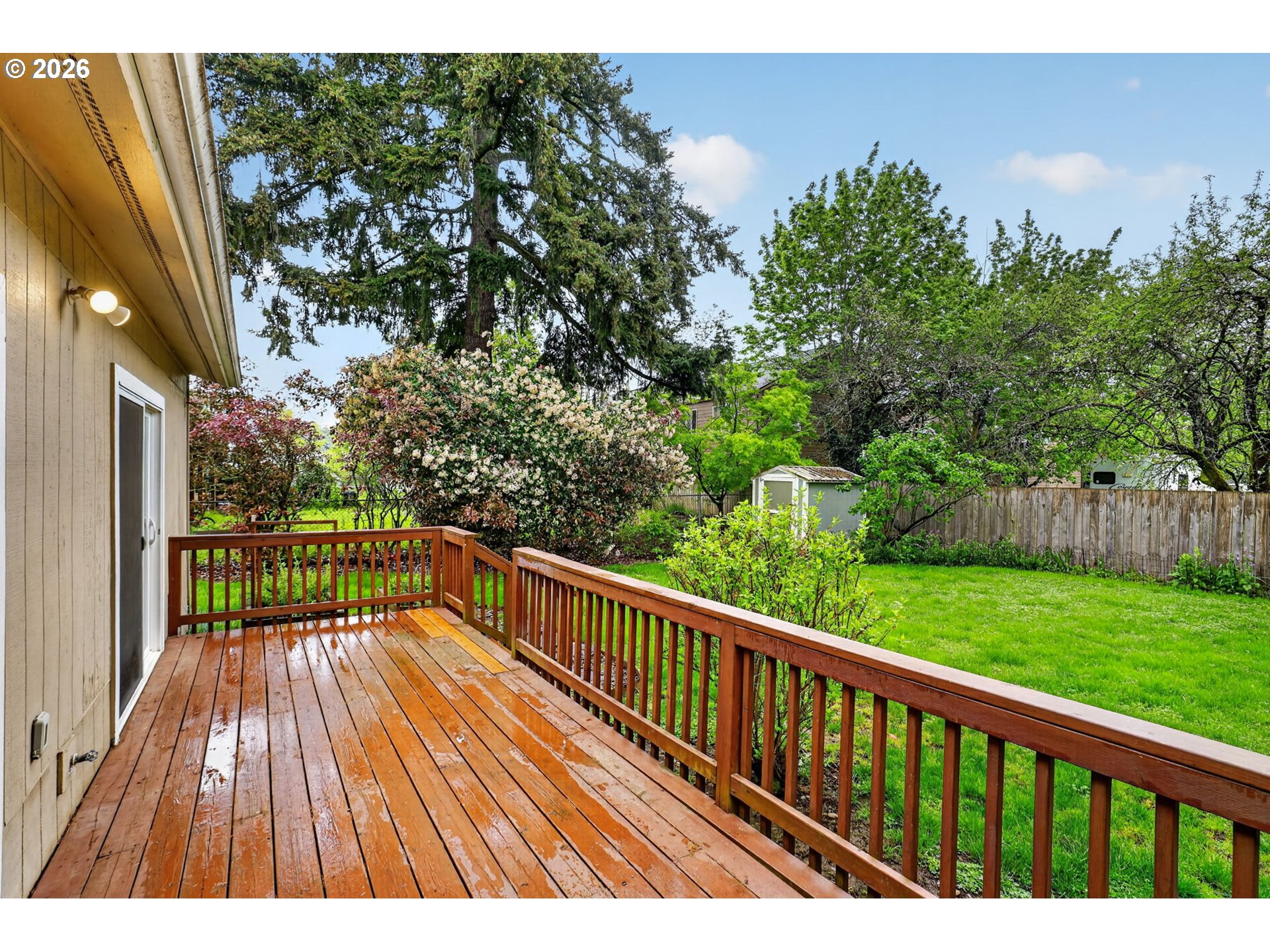 11824 Southeast Liebe Street Portland, OR 97266 - Photo 38 of 48 a view of balcony with wooden floor