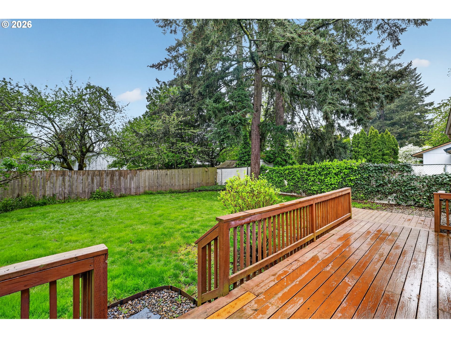 11824 Southeast Liebe Street Portland, OR 97266 - Photo 39 of 48 a view of deck with a garden