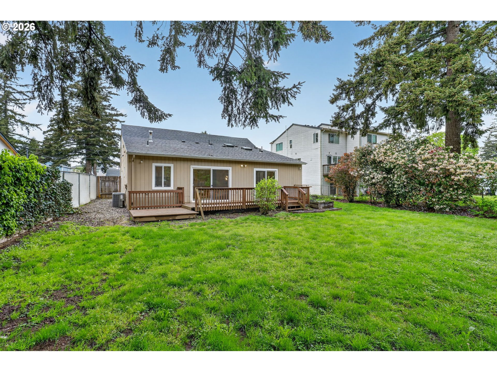 11824 Southeast Liebe Street Portland, OR 97266 - Photo 42 of 48 a view of house with yard and entertaining space