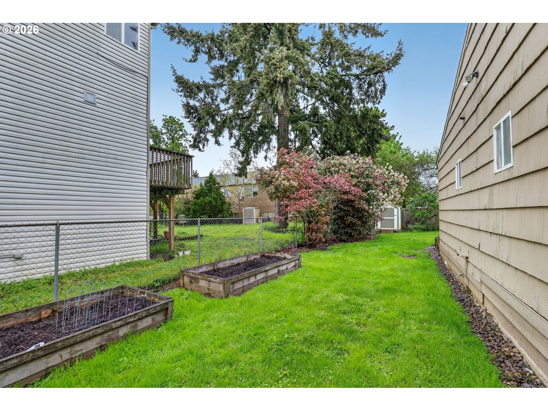 11824 Southeast Liebe Street Portland, OR 97266 - Photo 43 of 48 a view of a backyard with plants