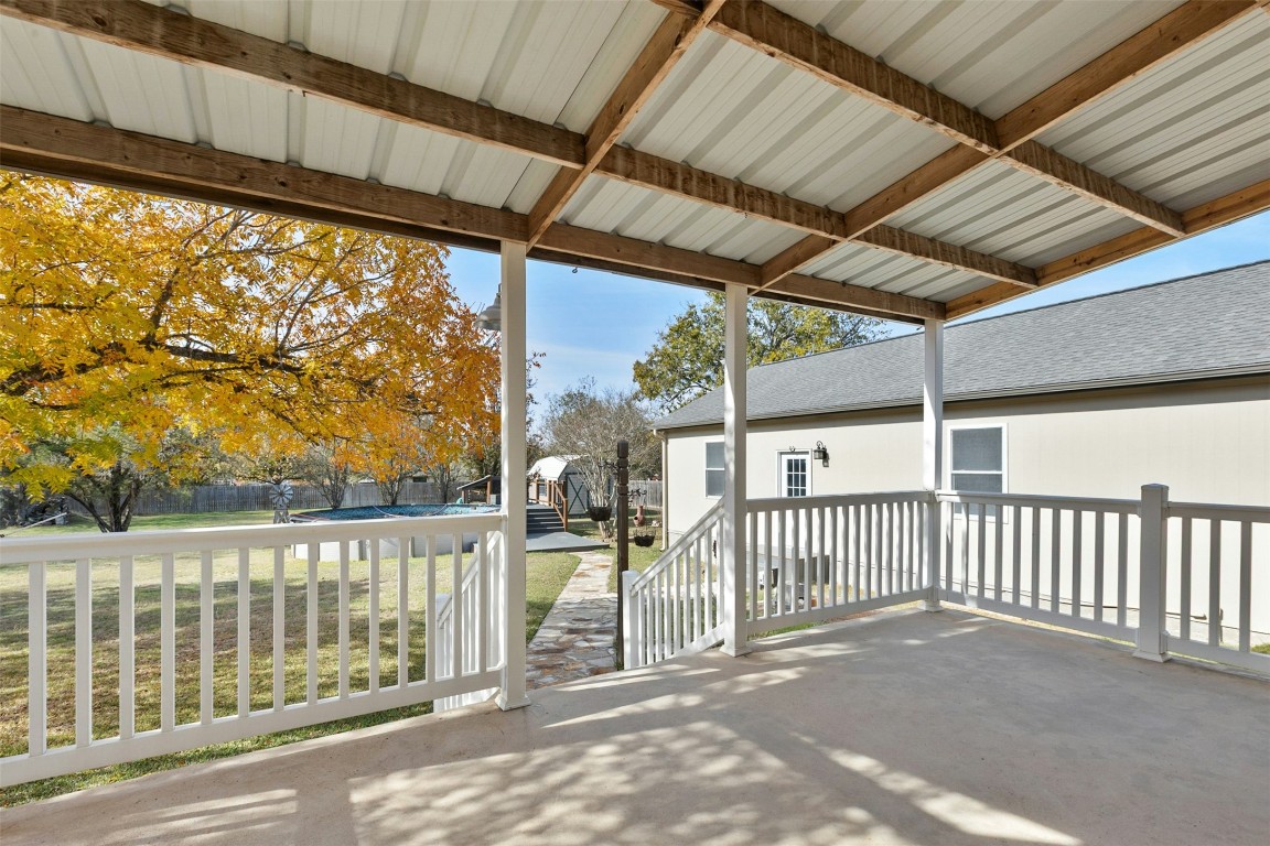 201 Millington Lane Buda, TX 78610 - Photo 21 of 28 Enjoy a large covered back porch perfect for relaxing or that morning coffee.