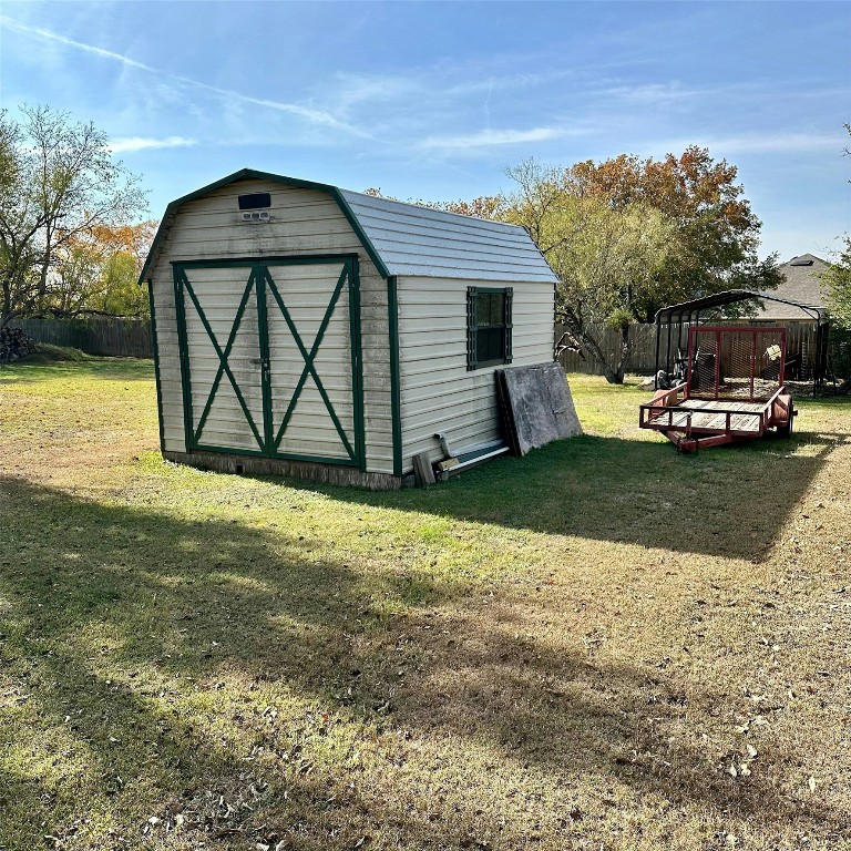 201 Millington Lane Buda, TX 78610 - Photo 28 of 28 Extra yard shed and rear covered carport