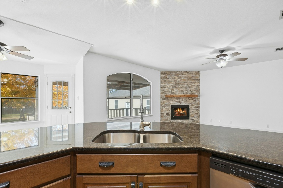 201 Millington Lane Buda, TX 78610 - Photo 6 of 28 The kitchen opens to the living space so the chef will never be left out!