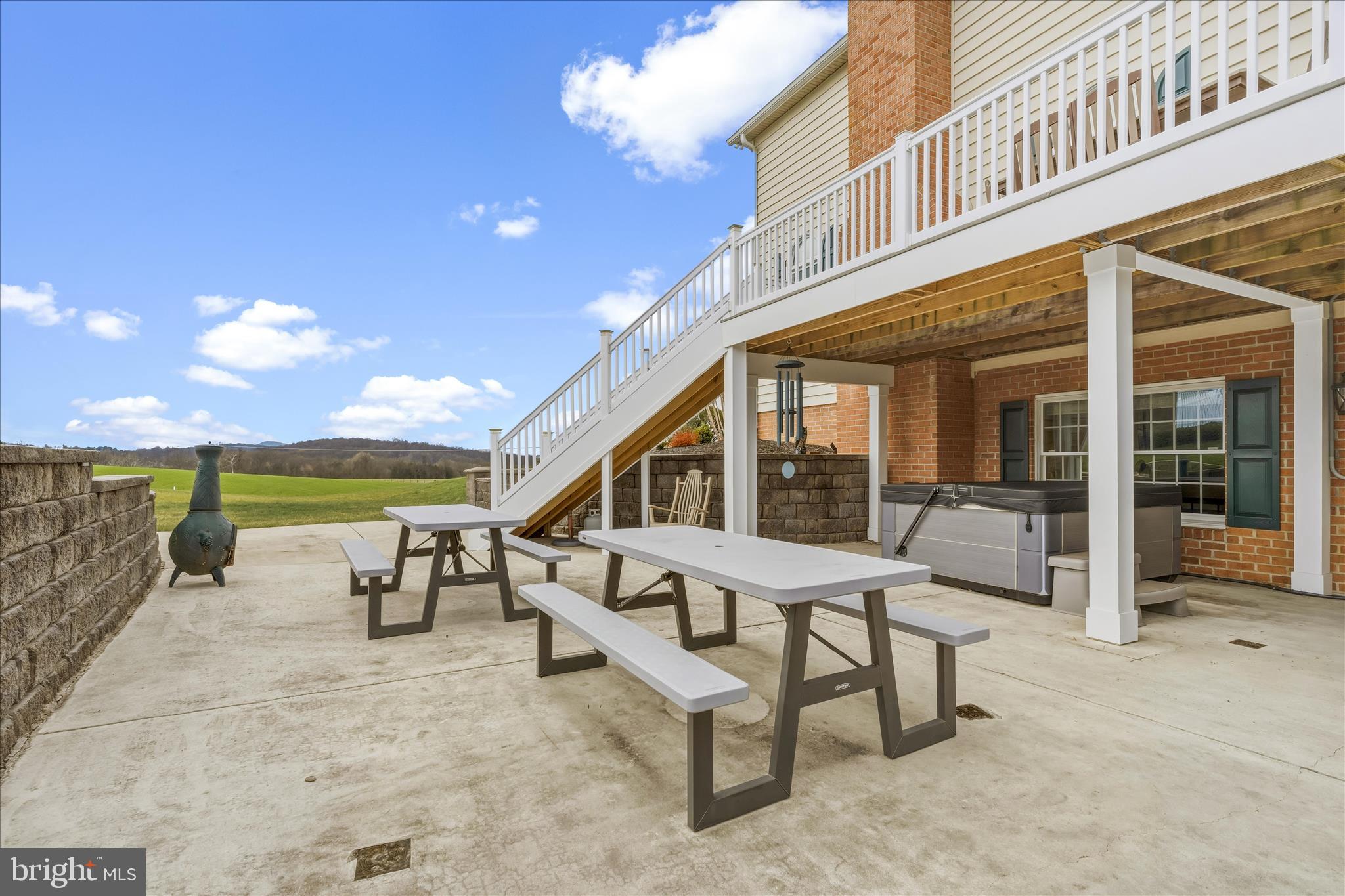 20819 Reno Monument Road Boonsboro, MD 21713 - Photo 54 of 66 a view of a house with backyard porch and sitting area