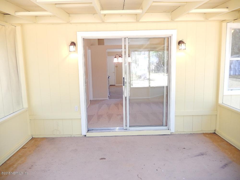 1265 Cutlass Road Orange Park, FL 32065 - Photo 36 of 41 an empty room with windows