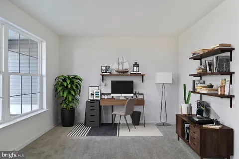 a view of a workspace with a window and workspace