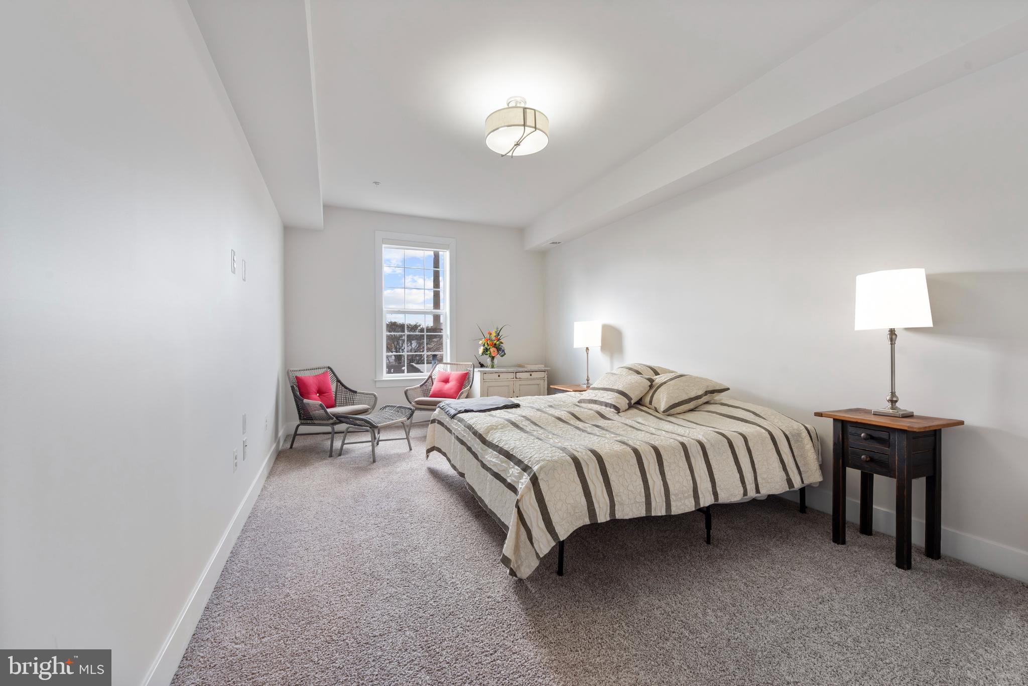 922 South Streeper Street Baltimore, MD 21224 - Photo 20 of 33 a bedroom with bed and a window