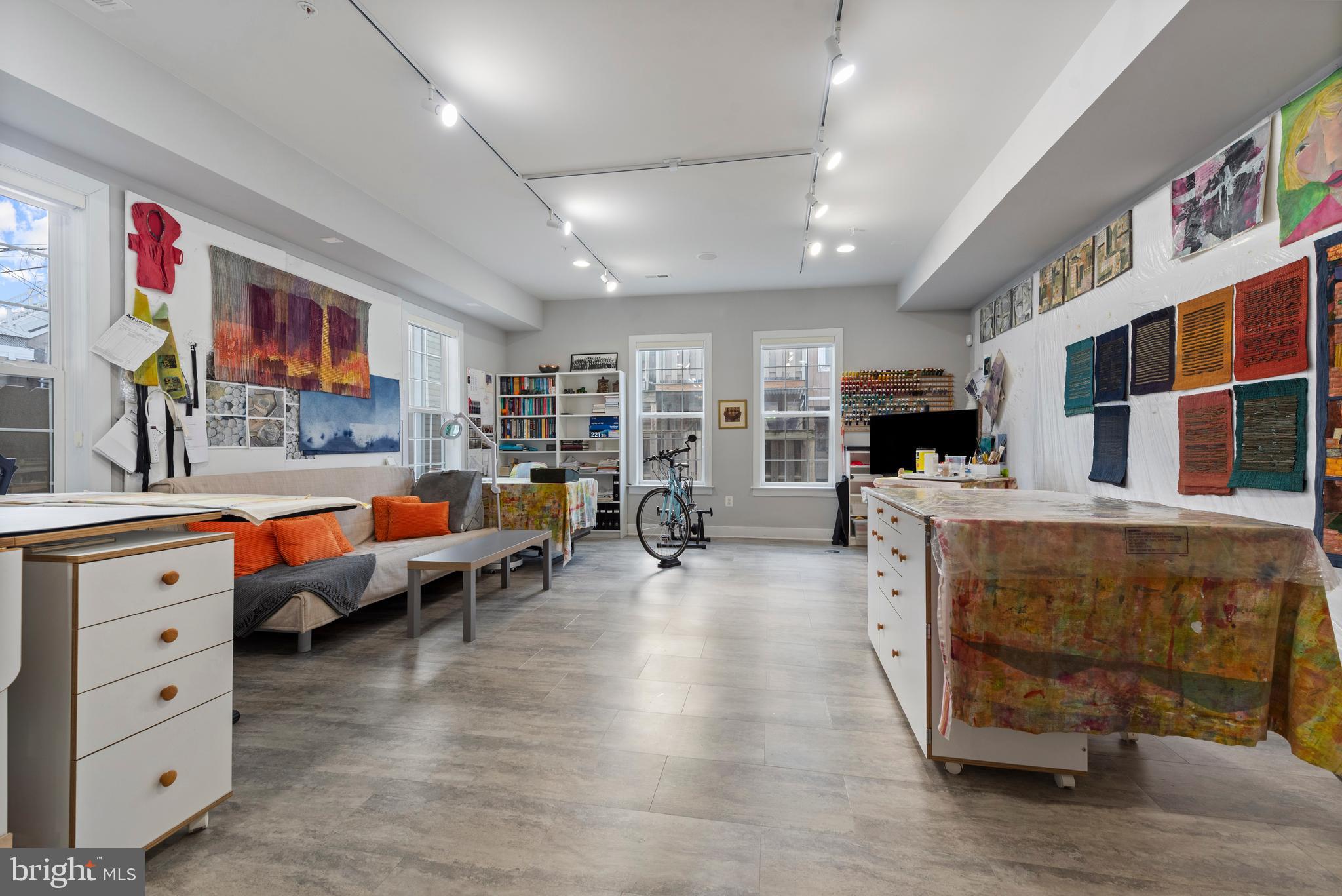 922 South Streeper Street Baltimore, MD 21224 - Photo 24 of 33 a living room with furniture and a flat screen tv