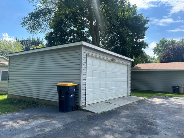 a view of a house and a yard