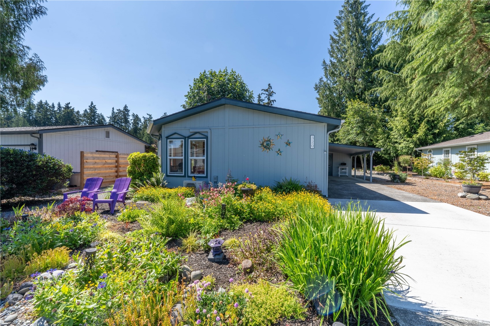 320 Fircrest Drive Sequim, WA 98382 - Photo 1 of 25 a view of a house with a yard and garden