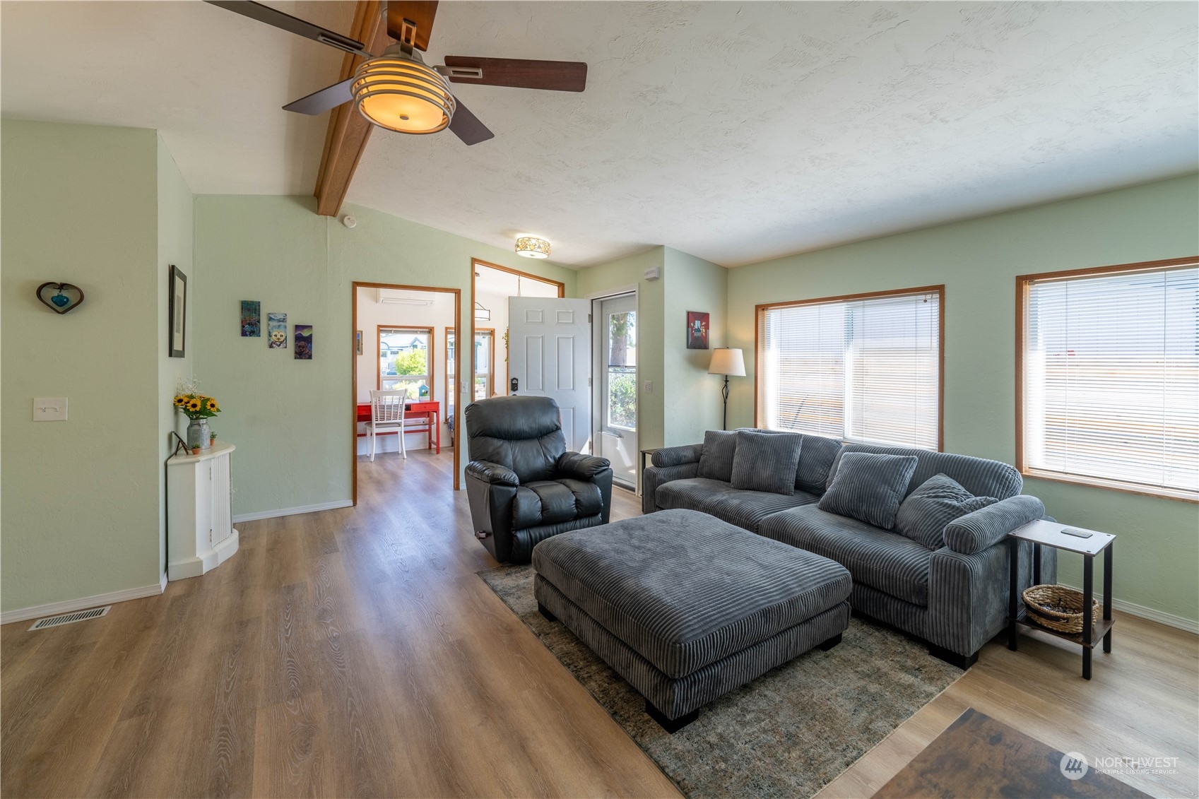 320 Fircrest Drive Sequim, WA 98382 - Photo 6 of 25 a living room with furniture and a wooden floor
