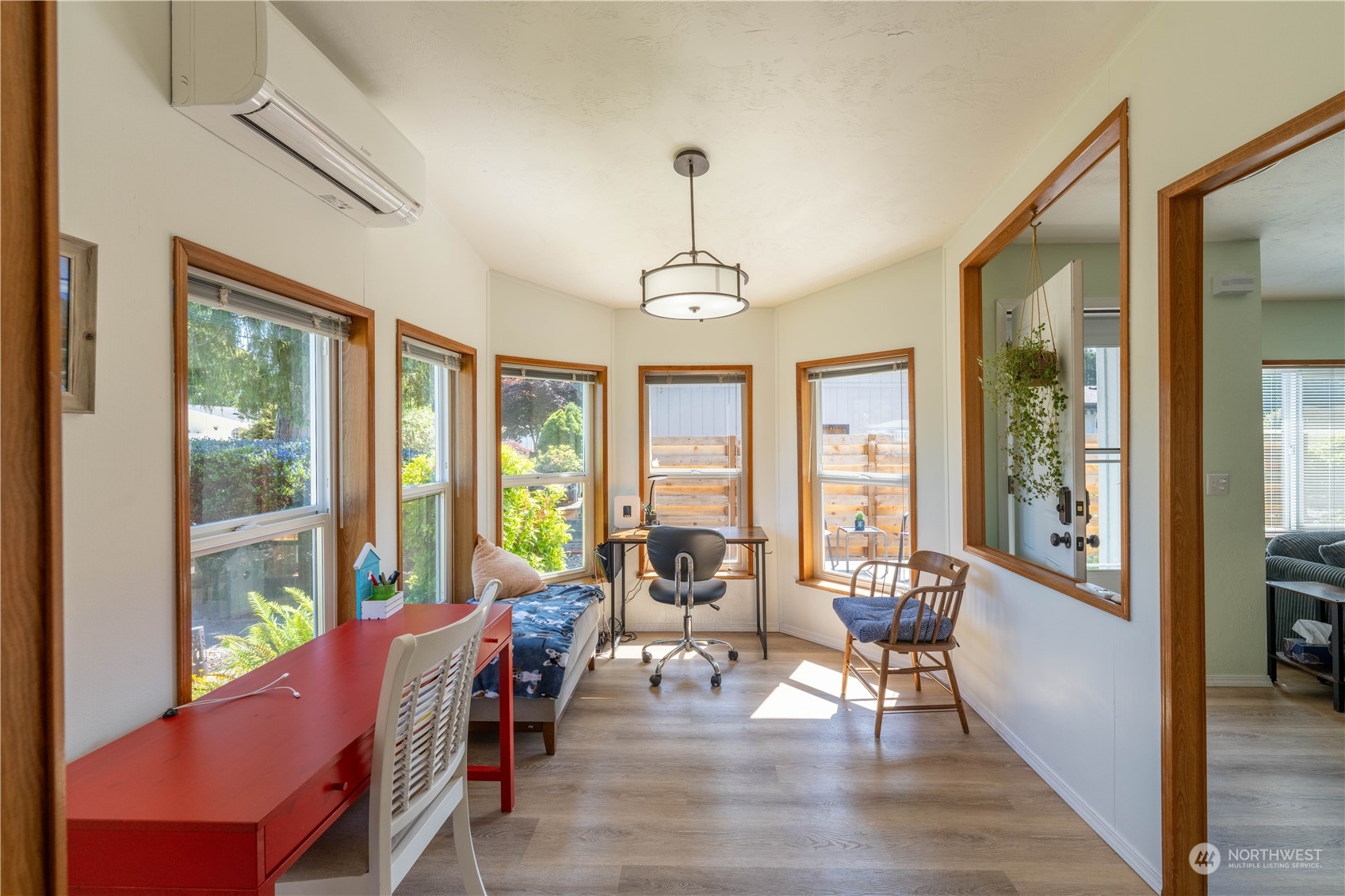 320 Fircrest Drive Sequim, WA 98382 - Photo 7 of 25 a living room with furniture a window and wooden floor